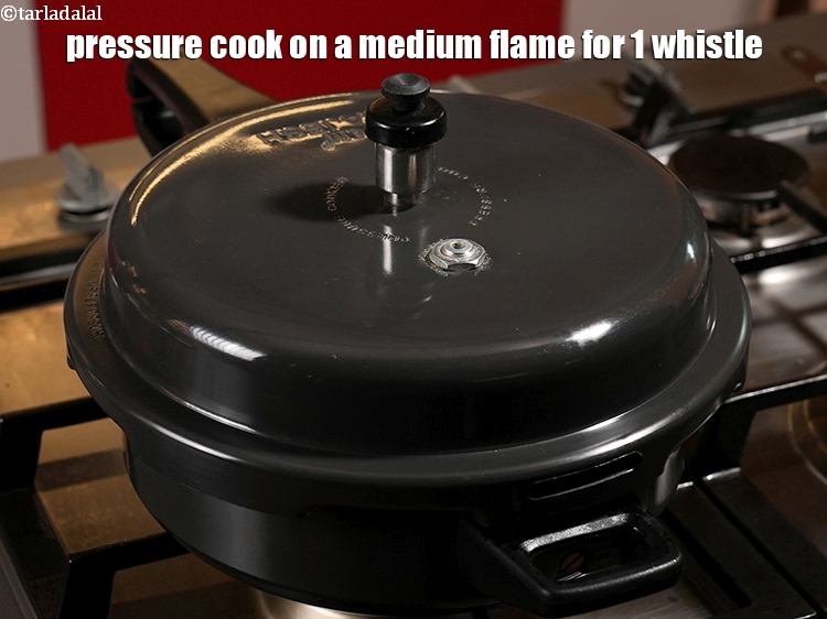 Step 31 – Pressure cook on a medium flame for 1 whistle.