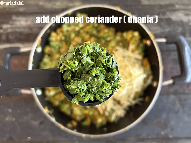 Step 31 – Add&nbsp;<meta charset="UTF-8" />2 tbsp&nbsp;<a href="glossary-chopped-coriander-783i">chopped coriander (dhania)</a>.
