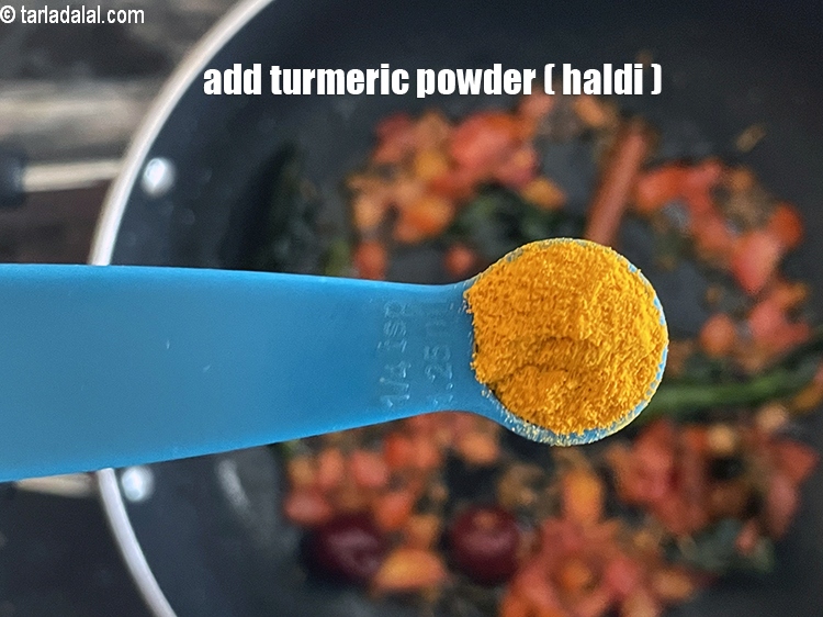 Step 31 – <p>Add 1/4 tsp <a href="https://www.tarladalal.com/glossary-turmeric-powder-haldi-645i"><strong>turmeric powder (haldi)</strong></a><strong>.</strong></p>