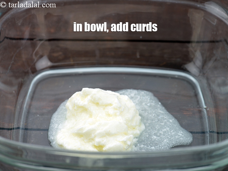 Step 36 – In a deep bowl, add &frac14; cup <a href="https://www.tarladalal.com/glossary-curd-dahi-yogurt-yoghurt-383i">curds (dahi)</a>.