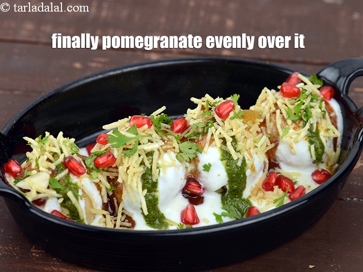 Step 32 – Finally 1 tbsp <a href="https://www.tarladalal.com/glossary-pomegranate-anar-587i">pomegranate (anar)</a> evenly over it.