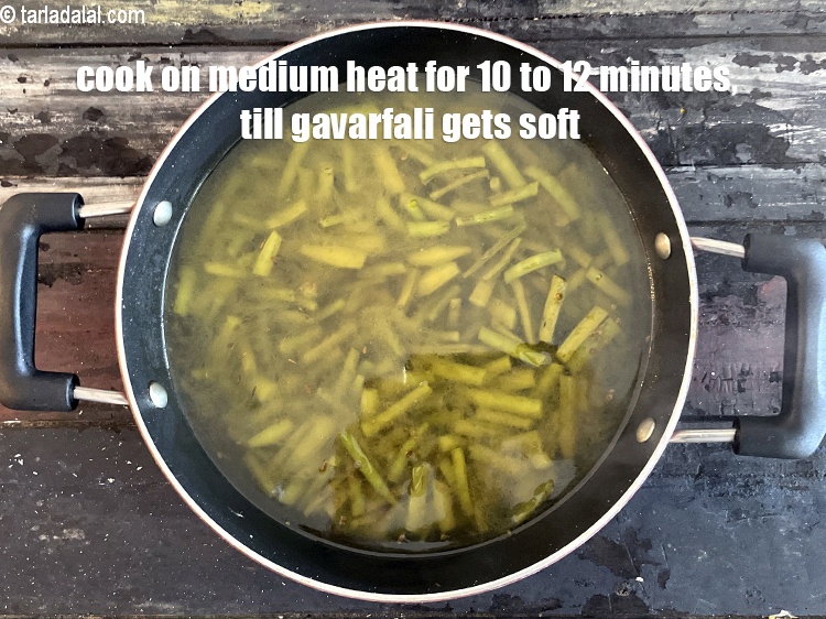 Step 32 – <strong>Cook on medium heat&nbsp;</strong>for 12&nbsp;to 15 minutes till the gavarfali is soft.