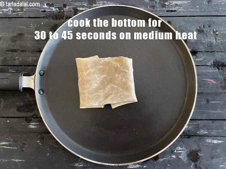 Step 50 – Cook the bottom for 30 to 45 seconds on medium heat.