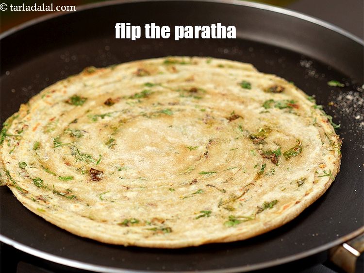 Step 31 – Flip the paratha.