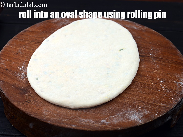 Step 33 – Roll into an oval shape 8&#39; inch (200mm)&nbsp;by 4&#39; inch (100mm) using a rolling pin.