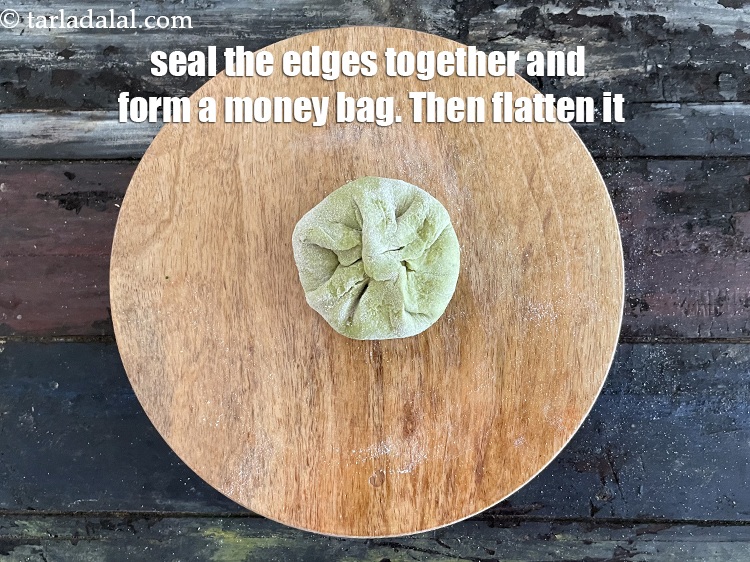 Step 33 – Seal the edges together and form a money bag. Flatten that as we are going …