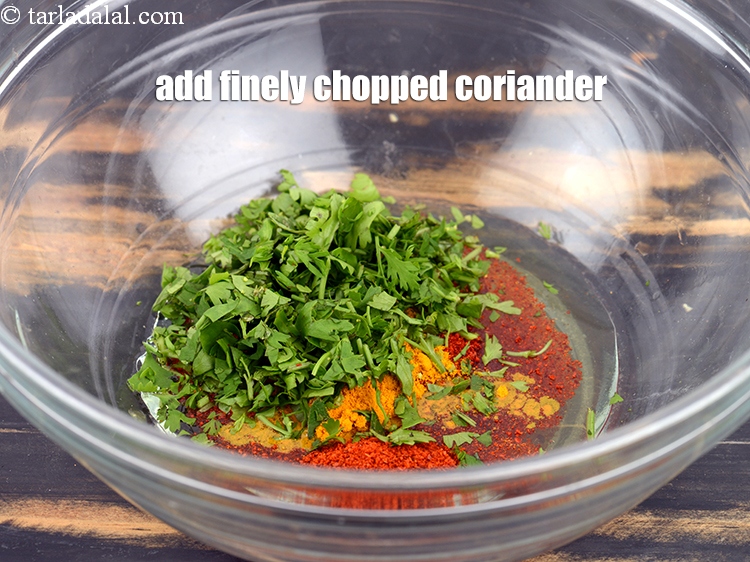 Step 33 – Add 1 tbsp&nbsp;finely&nbsp;<a href="https://www.tarladalal.com/glossary-chopped-coriander-783i">chopped coriander (dhania)</a>.&nbsp;