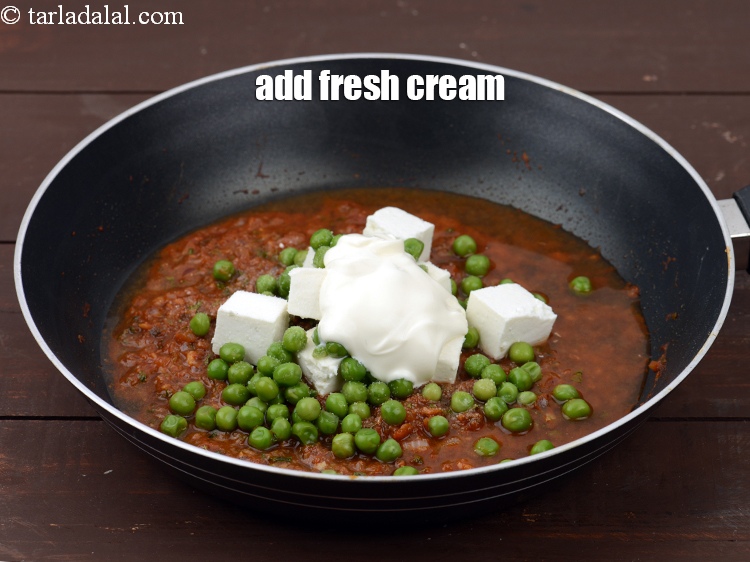 Step 33 – Add 2 tbsp fresh&nbsp;<a href="https://www.tarladalal.com/glossary-cream-malai-851i">cream</a>.