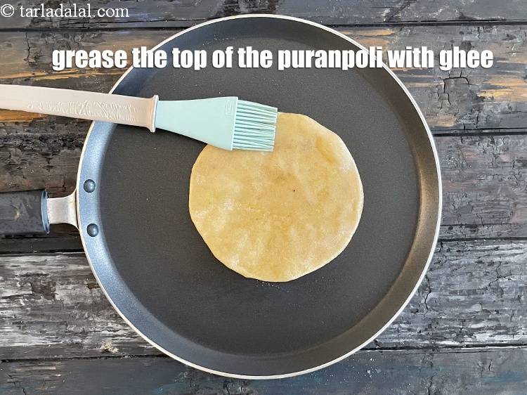 Step 31 – <meta charset="UTF-8" />Grease the top of the puran poli with ghee. Puran poli&#39;s taste best …