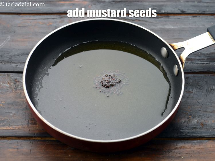 Step 36 – Add&nbsp;1/4 tsp&nbsp;<a href="glossary-mustard-seeds-sarson-rai-sarson-ke-beej-525i">mustard seeds ( rai / sarson)</a>.