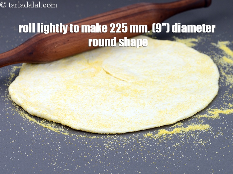 Step 31 – Roll lightly to make 225 mm. (9") diameter round shape.