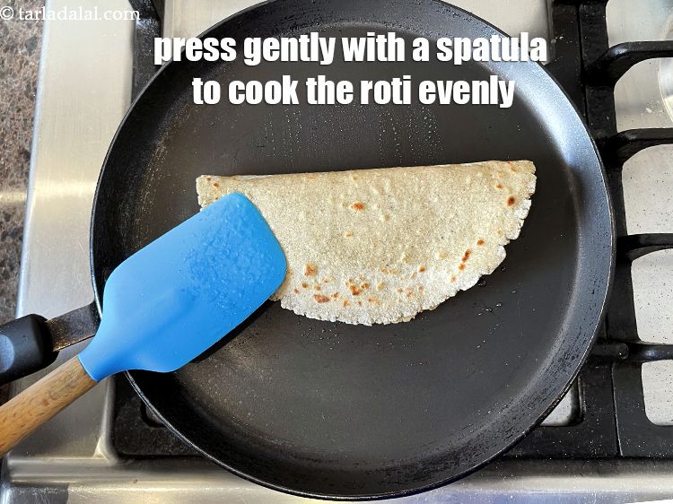 Step 34 – Press gently with a spatula to cook all over.