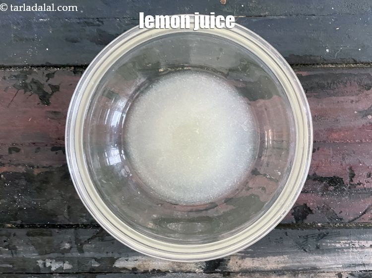 Step 31 – In a bowl put&nbsp;<meta charset="UTF-8" />2 tbsp&nbsp;<a href="glossary-lemon-juice-numbi-ka-ras-nimbu-ka-juice-471i">lemon juice</a>.