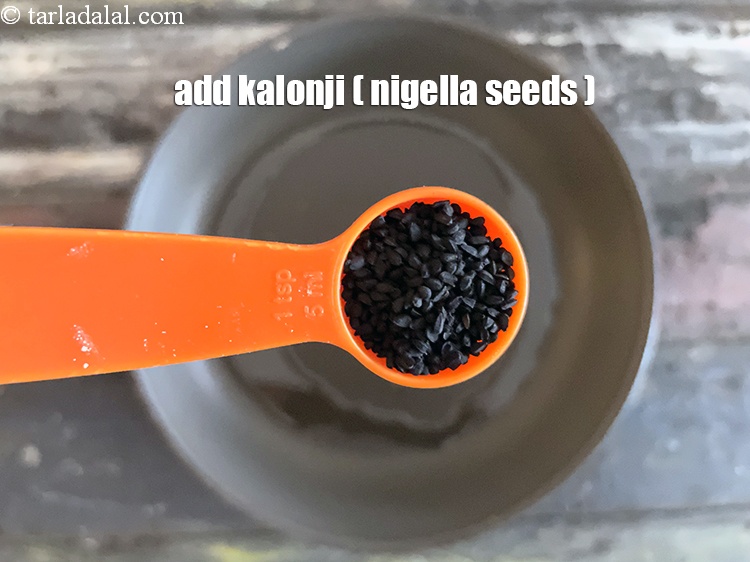 Step 33 – Add&nbsp;<meta charset="UTF-8" />1 tsp&nbsp;<a href="glossary-nigella-seeds-kalonji-onion-seeds-552i">nigella seeds (kalonji)</a>.