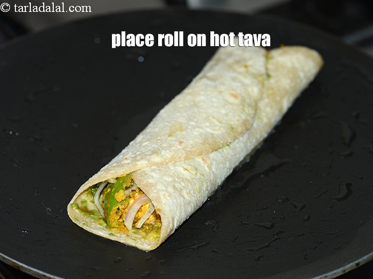 Step 32 – Place the roll on hot greased tava.