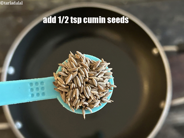 Step 14 – Add&nbsp;<meta charset="UTF-8" />1/2 tsp&nbsp;<a href="glossary-cumin-seeds-jeera-zeera-381i">cumin seeds (jeera)</a>.