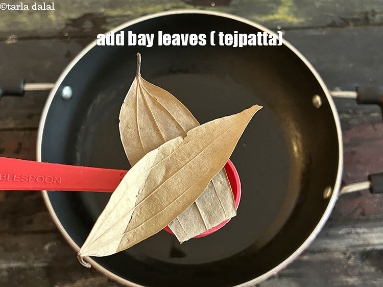 Step 4 – Add&nbsp;<meta charset="UTF-8" />2&nbsp;<a href="glossary-bay-leaf-tejpatta-bay-leaves-189i">bay leaves (tejpatta)</a>.