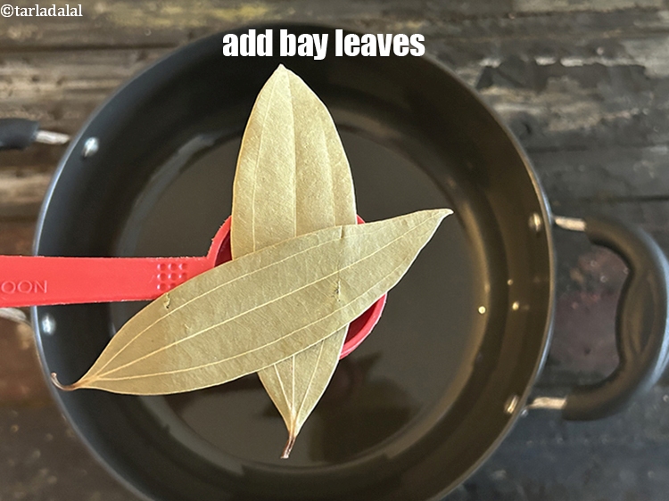 Step 16 – Add&nbsp;<meta charset="UTF-8" />2&nbsp;<a href="glossary-bay-leaf-tejpatta-bay-leaves-189i">bay leaves (tejpatta)</a>.