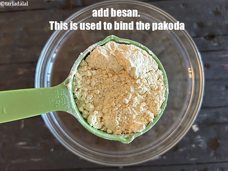 Step 27 – Add&nbsp;<!--%3Cmeta%20charset%3D%22UTF-8%22%20%2F%3E-->3/4 cup&nbsp;<a href="glossary-besan-chana-dal-flour-bengal-gram-flour-952i">besan (bengal gram flour)</a>. Besan helps bind the pakora.