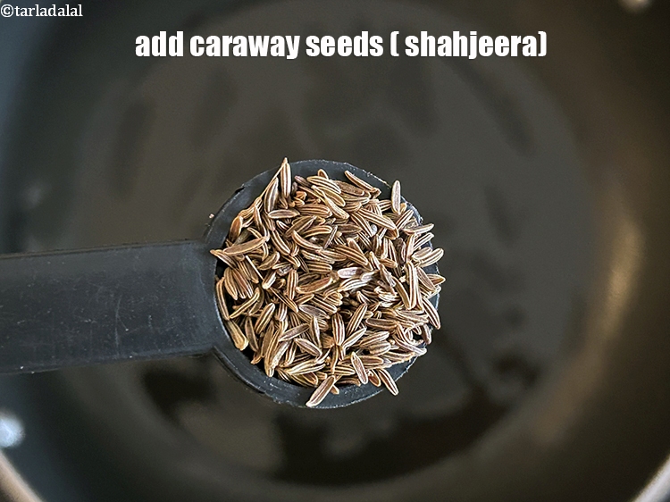 Step 10 – Add&nbsp;<meta charset="UTF-8" />1/2 tsp&nbsp;<a href="glossary-caraway-seeds-shahjeera-261i">caraway seeds (shahjeera)</a>.