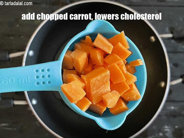 Step 9 – Add 1/2&nbsp;cup&nbsp;<a href="glossary-chopped-carrot-798i">chopped carrot</a>.&nbsp;Carrots&nbsp;<a href="https://www.tarladalal.com/recipes-for-Home-Remedies-to-relieve-Constipation-592">relieve constipation</a>,<a href="https://www.tarladalal.com/recipes-for-High-Blood-Pressure-644">&nbsp;lower blood pressure</a>, have&nbsp;<a href="https://www.tarladalal.com/recipes-for-High-Fiber-819">fibre</a>&nbsp;and&nbsp;<a href="https://www.tarladalal.com/recipes-for-Low-Cholesterol--380">lower cholesterol</a>.