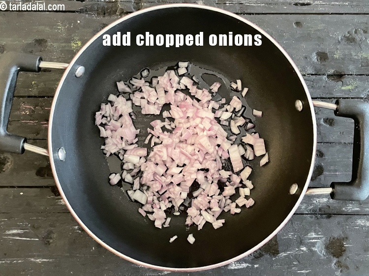 Step 23 – <meta charset="UTF-8" /> Add&nbsp;1/2 cup&nbsp;<a href="glossary-chopped-onions-722i">chopped onions</a>.