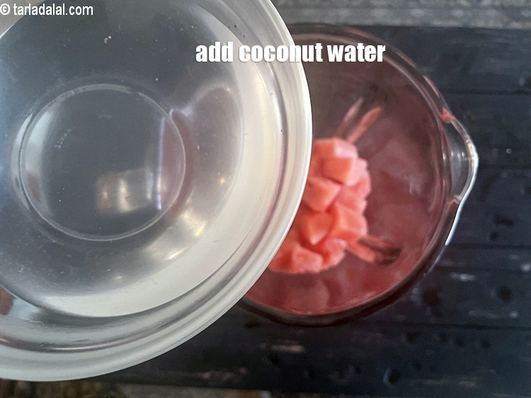 Step 6 – <html><head></head><body><p>Add&nbsp;1 cup&nbsp;tender&nbsp;<a href="glossary-coconut-water-nariyal-pani-nariyali-paani-273i">coconut water</a>&nbsp;(nariyal paani).</p></body></html>
