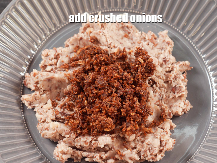 Step 7 – Add 1/4 cup crushed <a href="https://www.tarladalal.com/brown-onions-42752r">brown onions</a>.