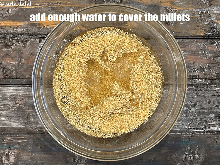 Step 5 – Add&nbsp;enough water to cover the millets.