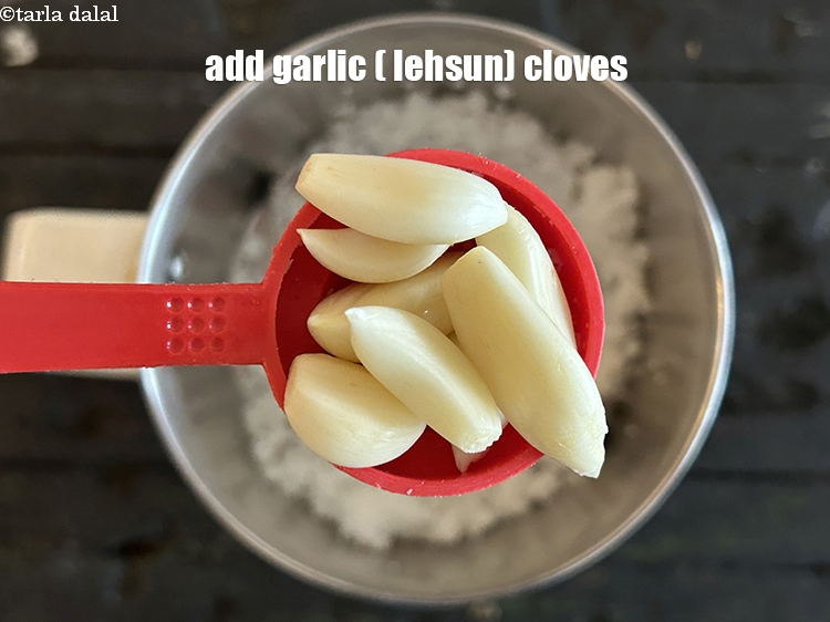 Step 6 – Add&nbsp;8&nbsp;<a href="glossary-garlic-cloves-1857i">garlic (lehsun) cloves</a>.&nbsp;