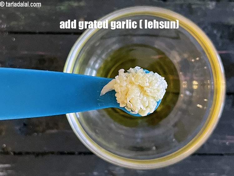 Step 17 – Add&nbsp;<meta charset="UTF-8" />1/4 tsp&nbsp;<a href="glossary-grated-garlic-859i">grated garlic (lehsun)</a>.