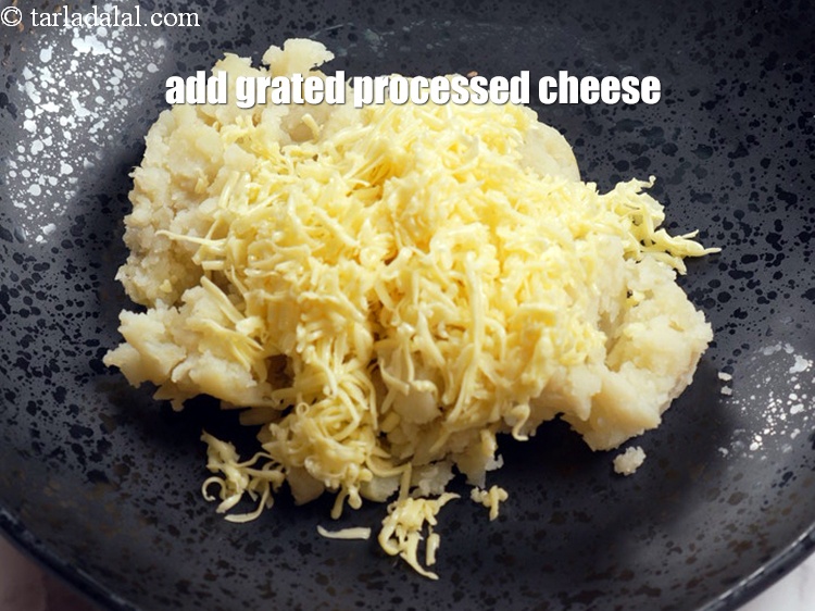 Step 4 – Add 1/2 cup&nbsp;<a href="https://www.tarladalal.com/glossary-grated-processed-cheese-868i">grated processed cheese</a>.&nbsp;