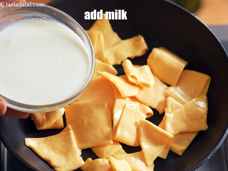 Step 20 – Add 3/4 cup&nbsp;<a href="https://www.tarladalal.com/glossary-milk-doodh-full-cream-milk-514i">milk</a>.&nbsp;