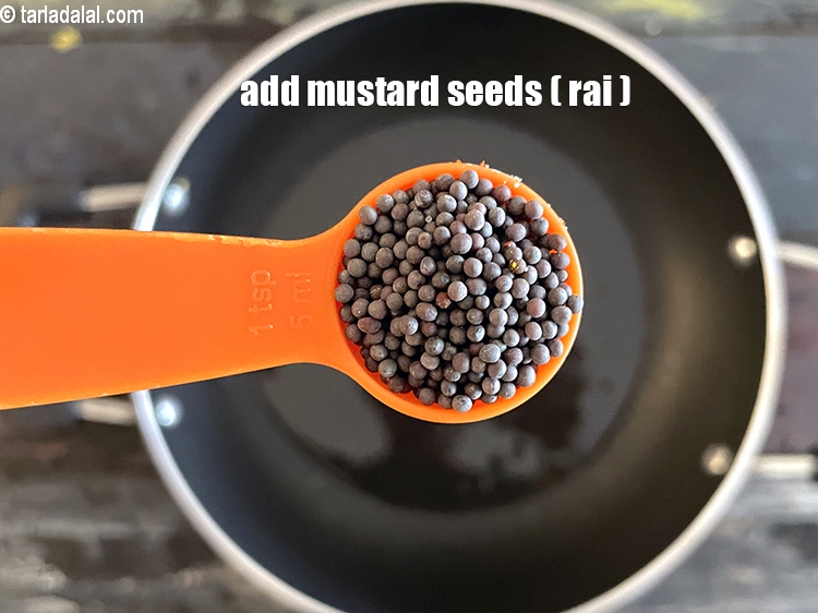 Step 15 – Add&nbsp;<meta charset="UTF-8" />1 tsp&nbsp;<a href="glossary-mustard-seeds-sarson-rai-sarson-ke-beej-525i">mustard seeds ( rai / sarson)</a>.