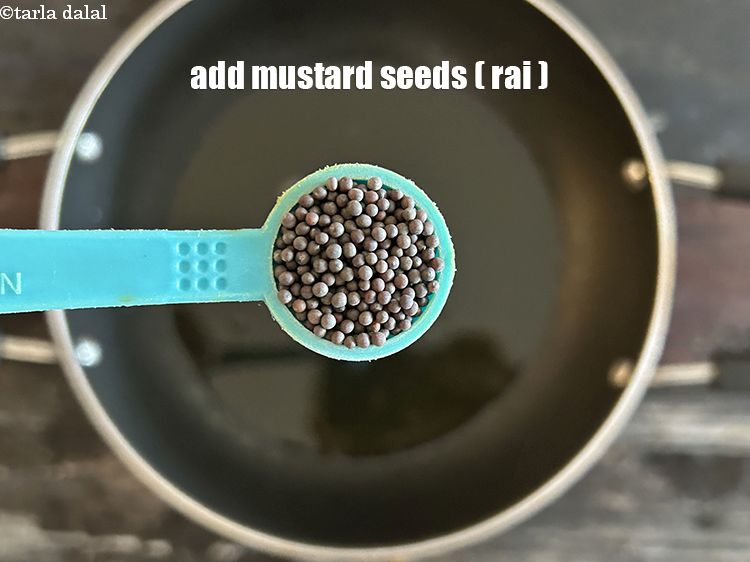 Step 4 – <meta charset="UTF-8" /> <meta charset="UTF-8" />Add&nbsp;1/2&nbsp;tsp&nbsp;<a href="glossary-mustard-seeds-sarson-rai-sarson-ke-beej-525i">mustard seeds ( rai / sarson)</a>.&nbsp;