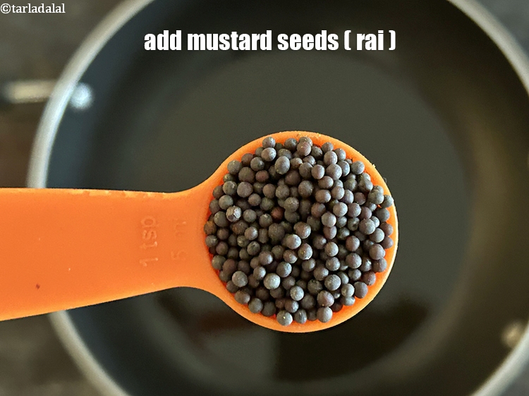 Step 4 – Add&nbsp;<meta charset="UTF-8" />1 tsp&nbsp;<a href="glossary-mustard-seeds-sarson-rai-sarson-ke-beej-525i">mustard seeds ( rai / sarson)</a>.
