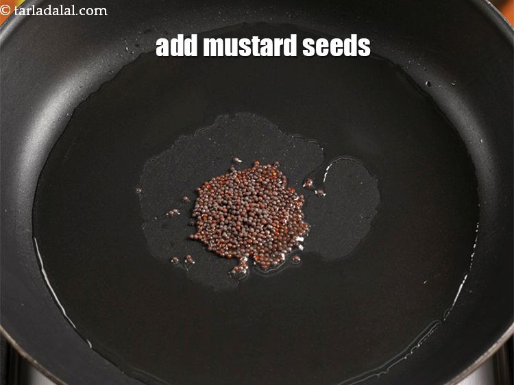 Step 4 – Add 1 tsp <a href="https://www.tarladalal.com/glossary-mustard-seeds-sarson-rai-sarson-ke-beej-525i">mustard seeds ( rai / sarson)</a>.