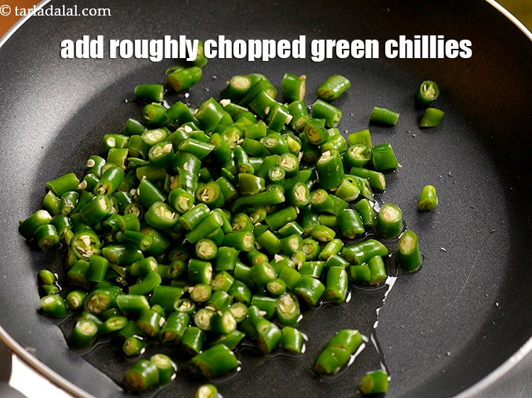 Step 4 – Add 1/2 cup&nbsp;roughly&nbsp;<a href="https://www.tarladalal.com/glossary-chopped-green-chilli-820i">chopped green chillies</a>.&nbsp;