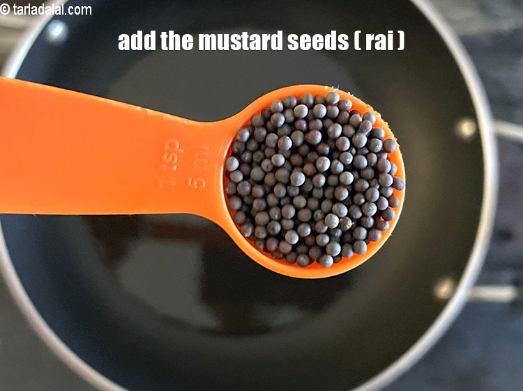 Step 4 – Add&nbsp;<meta charset="UTF-8" />1 1/2 tsp&nbsp;<a href="glossary-mustard-seeds-sarson-rai-sarson-ke-beej-525i">mustard seeds ( rai / sarson)</a>.