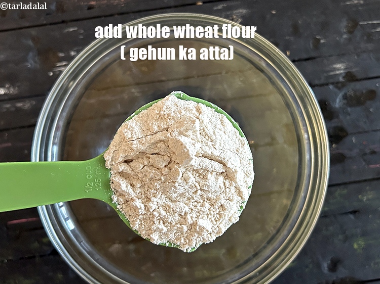 Step 13 – Add&nbsp;<meta charset="UTF-8" />3/4 cup&nbsp;<a href="glossary-whole-wheat-flour-gehun-ka-atta-gehun-ka-aata-429i">whole wheat flour (gehun ka atta)</a>.