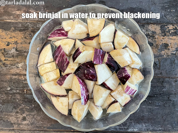 Step 4 – Soak&nbsp;<meta charset="UTF-8" />2 cups&nbsp;chopped&nbsp;<a href="glossary-brinjal-baingan-eggplant-aubergine-128i">brinjals (baingan / eggplant)</a>&nbsp; in enough water till you want to …