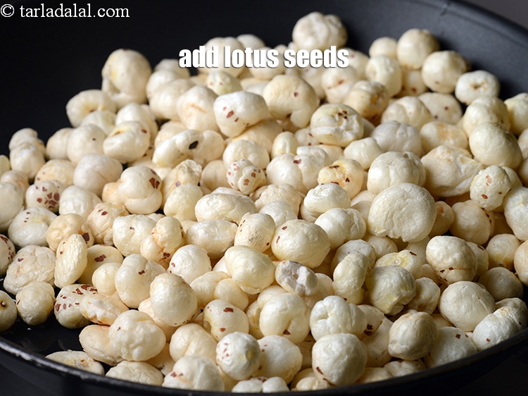 Step 5 – Add 3&frac12; cups of <a href="https://www.tarladalal.com/glossary-lotus-seeds-makhana-fox-nuts-kamal-ke-beej-507i">lotus seeds (makhana)</a>.