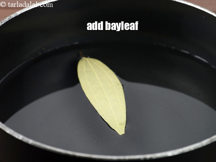Step 6 – Add 1&nbsp;<a href="https://www.tarladalal.com/glossary-bay-leaf-tejpatta-bay-leaves-189i">bayleaf (tejpatta)</a>.