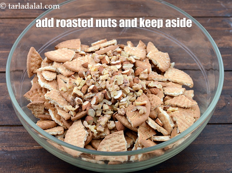 Step 4 – Add 1/4 cup&nbsp;roasted nuts and keep aside.&nbsp;