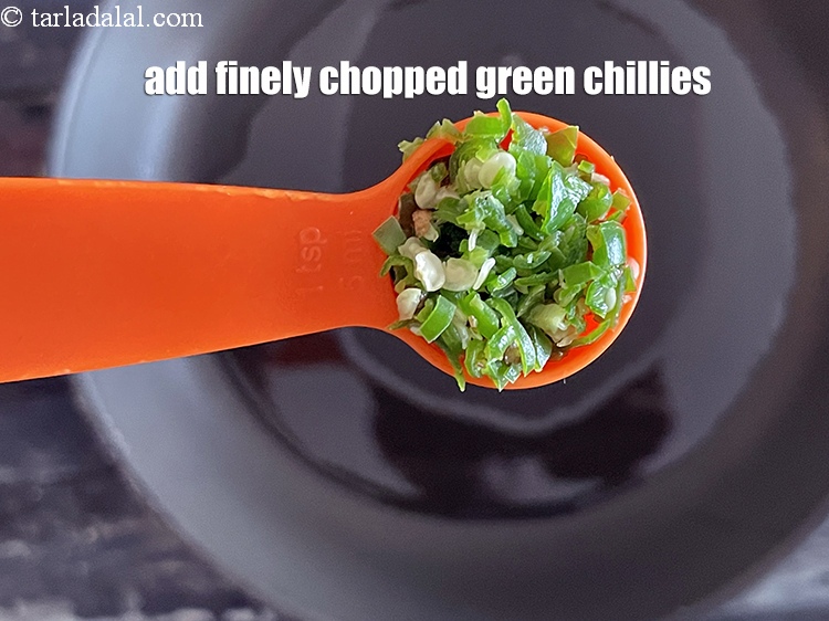Step 11 – Add&nbsp;<meta charset="UTF-8" />1 tsp&nbsp;finely&nbsp;<a href="glossary-chopped-green-chilli-820i">chopped green chillies</a>.