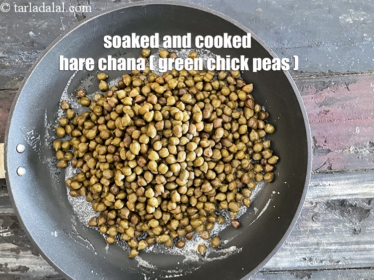 Step 14 – Add&nbsp;<meta charset="UTF-8" />2 cups&nbsp;<a href="glossary-hara-chana-green-chick-peas-289i">hara chana (green chick peas)</a>&nbsp;, soaked and boiled. See above on …