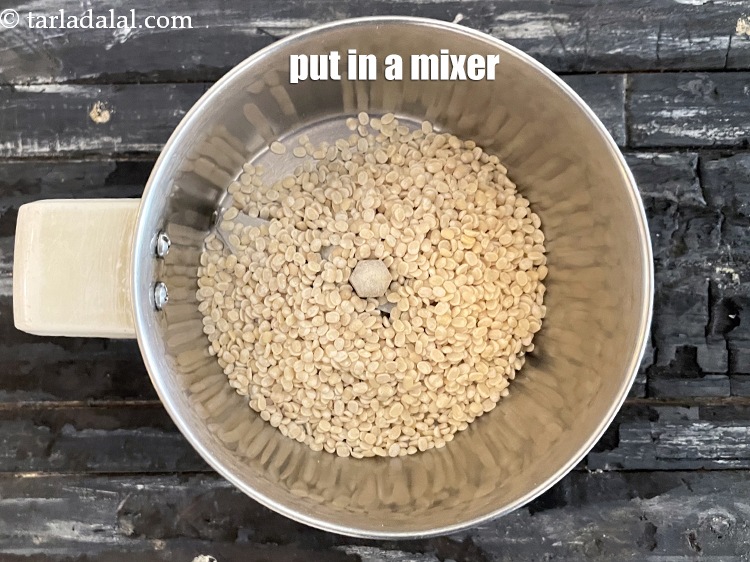 Step 4 – Put the urad dal in a mixer.