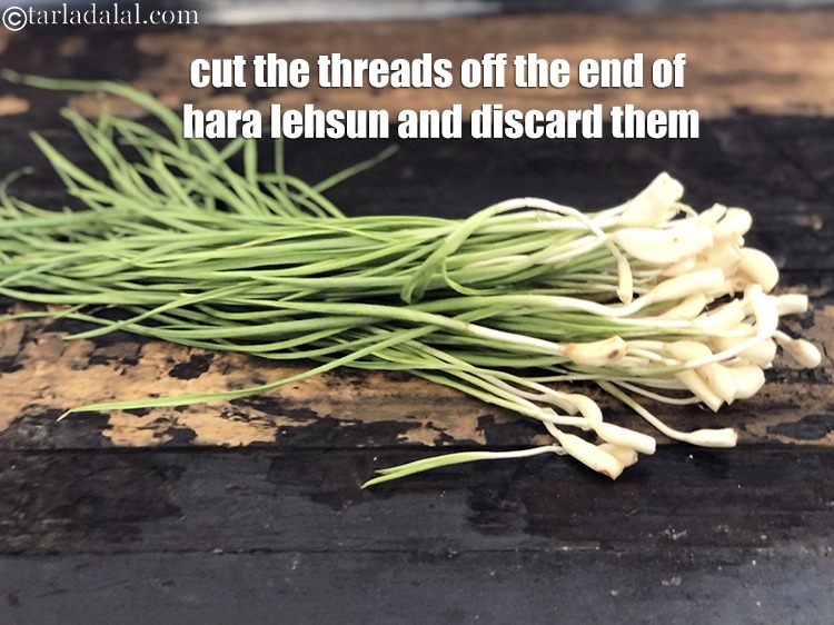 Step 6 – <meta charset="UTF-8" />Cut the threads off the end of the hara lehsun and discard them.&nbsp;