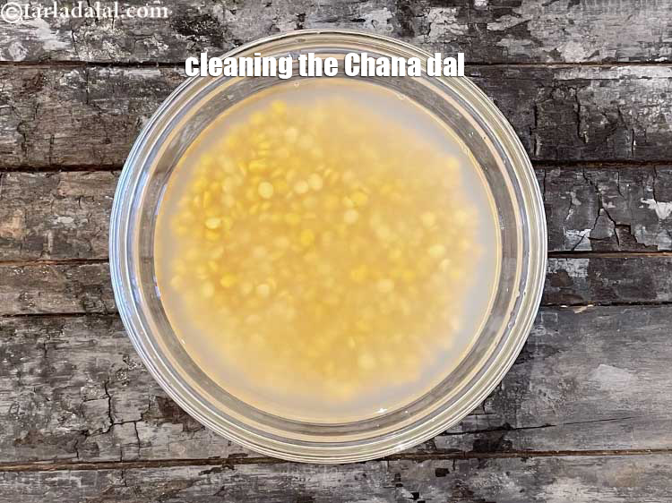 Step 2 – Add water to it and clean the chana dal. <strong>You can see that the water …