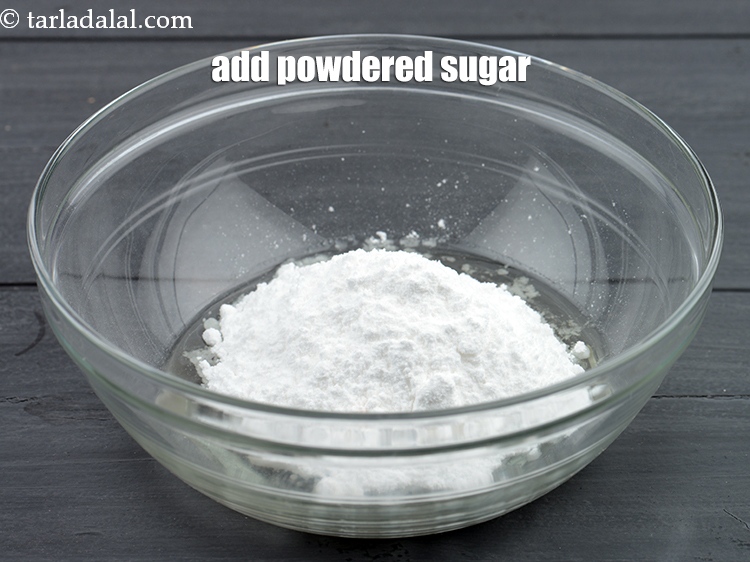 Step 4 – Add &frac34; cup <a href="https://www.tarladalal.com/glossary-powdered-sugar-280i">powdered sugar</a>.
